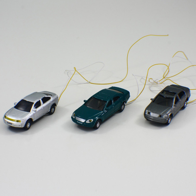 les voitures modèles faites sur commande d'échelle de 1:75 de l'éclairage 12V, allient mini meurent des fontes pour la disposition de construction de bord de la route fournisseur